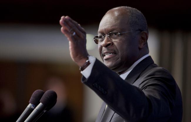 © Bloomberg. Republican presidential candidate Herman Cain, former chairman and chief executive officer of Godfather's Pizza, speaks during a luncheon at the National Press Club in Washington, D.C., U.S., on Monday, Oct. 31, 2011. Cain said the U.S. Equal Employment Opportunity Commission investigated allegations he sexually harassed an employee and found 