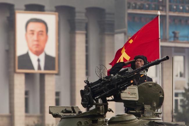 © Bloomberg. A member of the North Korean military salutes during a parade commemorating the 65th anniversary of the Korean Worker's Party in Pyongyang, North Korea.
