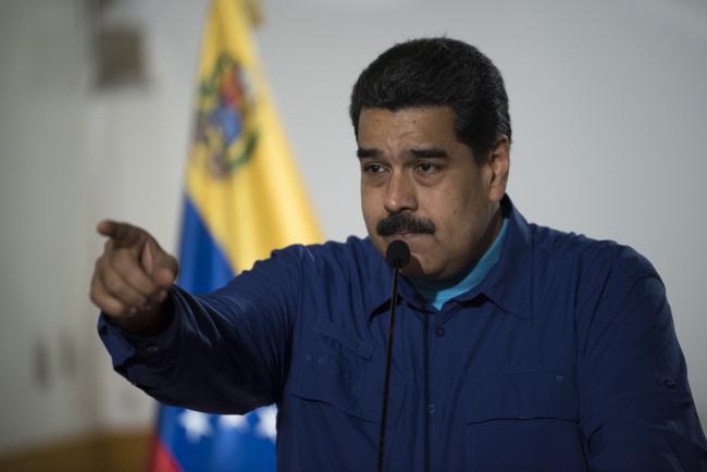 © Bloomberg. Nicolas Maduro, Venezuela's president, gestures during a rally in Caracas, Venezuela, on Wednesday, Feb. 7, 2018. Maduro and his allies have exited the United Socialist Party (PSUV) to create a new movement called 'We Are Venezuela' ahead of the April 22 election.