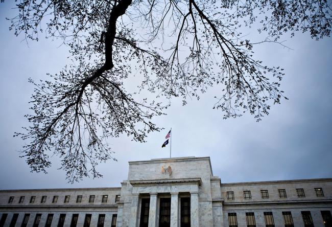 © Bloomberg. The U.S. Federal Reserve building stands in Washington D.C. Photographer: Brendan Smialowski/Bloomberg