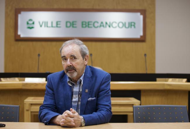 © Bloomberg. Jean-Guy Dubois, mayor of Becancour, speaks during an interview at City Hall in Becancour, Quebec, Canada, on Tuesday, Aug. 7, 2018. Photographer: Christinne Muschi/Bloomberg