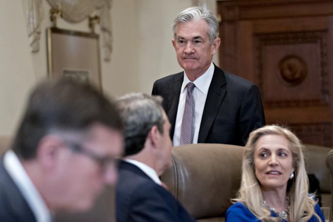© Bloomberg. Jerome Powell, chairman of the Federal Reserve, arrives for a Federal Reserve Board meeting in Washington, D.C., U.S., on Monday, April 8, 2019. The Federal Reserve Board today is considering new rules governing the oversight of foreign banks. Powell said the Fed wants foreign lenders treated similarly to U.S. banks. Photographer: Andrew Harrer/Bloomberg