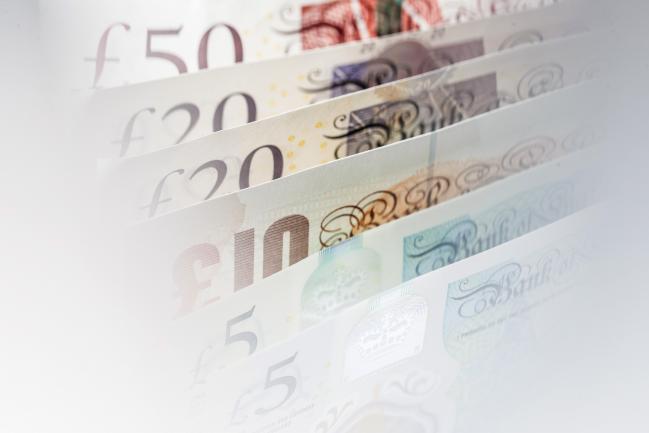 © Bloomberg. A collection of five, ten, twenty and fifty British pound banknotes stand in this arranged photograph in London, U.K., on Thursday, Oct. 13, 2016. The U.K. currency is getting harder to trade, and to predict, because the nation’s exit from the European Union has changed the rules of engagement.