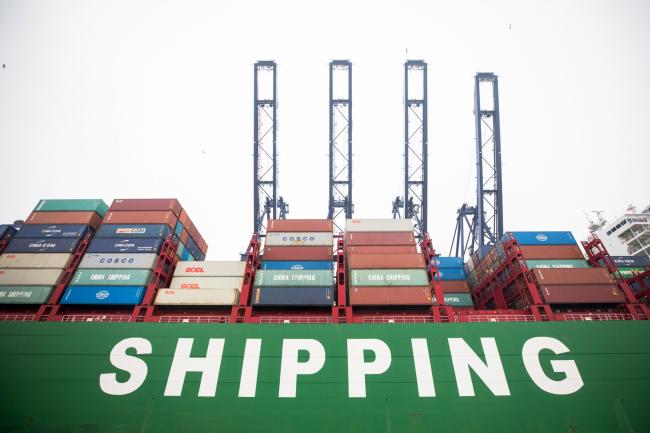 © Bloomberg. The CSCL Indian Ocean container ship, operated by China COSCO Shipping Corp Ltd., stands on the dockside at the Port of Felixstowe Ltd., a subsidiary of CK Hutchison Holdings Ltd., in Felixstowe, U.K., on Friday, March 22, 2019. Container terminals including Felixstowe, Southampton, London and Teesport stand to benefit from a no-deal Brexit because, unlike ferry ports, their reliance on traffic from Asia and the Americas means they’re already geared up for the customs checks that could accompany a no-deal split. 