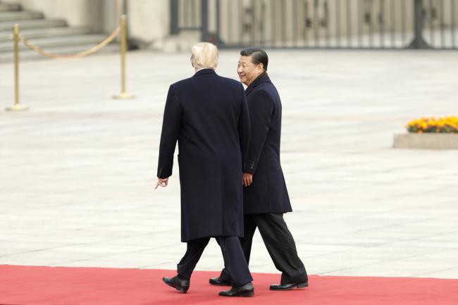 © Bloomberg. Donald Trump and Xi Jinping on Nov. 9, 2017. Photographer: Qilai Shen/Bloomberg