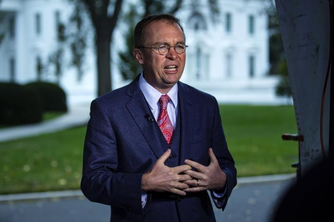 © Bloomberg. Mulvaney speaks during an interview outside of the White House in Washington on Oct. 26. Photographer: Al Drago/Bloomberg