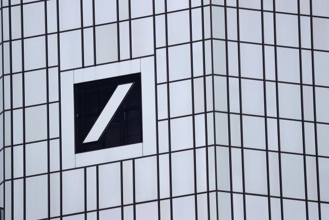 © Bloomberg. The Deutsche Bank AG logo sits on the glass facade of the bank's headquarters in Frankfurt, Germany, on Thursday, Jan. 31, 2019. On the eve of fourth-quarter results that are likely to reflect its troubles, Deutsche Bank AG’s ability to avoid a government-brokered merger with Commerzbank could rest on its performance in the first quarter of 2019, according to people briefed on the thinking of its top executives. 
