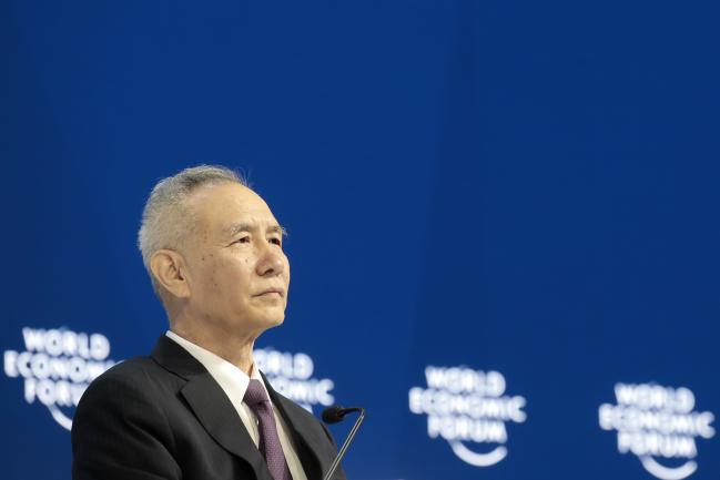 © Bloomberg. Liu He, director of the central leading group of the Communist Party of China, looks on during a special session on day two of the World Economic Forum (WEF) in Davos, Switzerland, on Wednesday, Jan. 24, 2018. World leaders, influential executives, bankers and policy makers attend the 48th annual meeting of the World Economic Forum in Davos from Jan. 23 - 26.