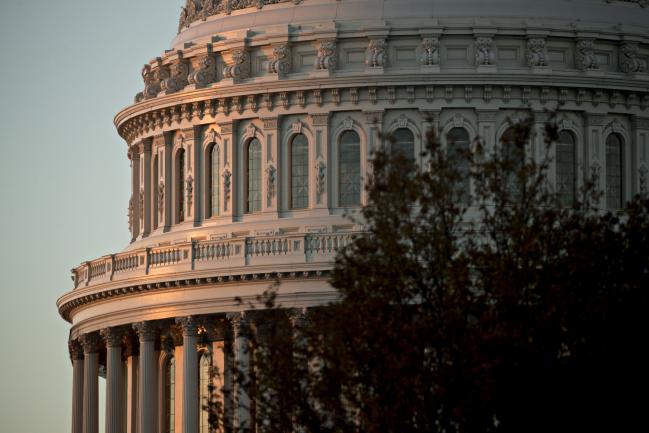 © Bloomberg. The U.S. Capitol stands at sunrise in Washington, D.C., U.S., on Wednesday, Nov. 29, 2017. The $1.4 trillion tax-cut measure gained momentum when the Senate Budget Committee voted Tuesday to send it to the Senate floor.The next step Wednesday may be a procedural vote to begin debate -- but success on that doesn't guarantee the bill will have enough votes for final passage.