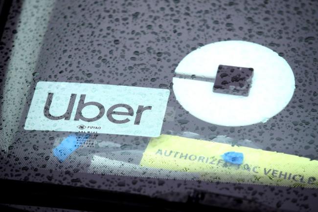 © Bloomberg. SAN FRANCISCO, CALIFORNIA - MARCH 22: The Uber logo is displayed on a car on March 22, 2019 in San Francisco, California. Uber Technologies Inc. announced that it has selected the New York Stock Exchange for its much anticipated initial public offering that could be one of the top five IPOs in history. The listing could value the ride sharing company at over $120 billion. (Photo by Justin Sullivan/Getty Images) 