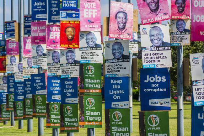 © Bloomberg. General election campaign posters are displayed in Pretoria, South Africa. Photographer: Waldo Swiegers/Bloomberg