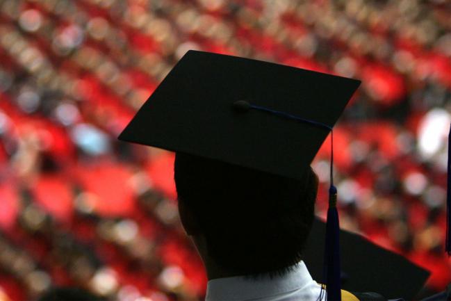 © Bloomberg. BEIJING, CHINA - JULY 18: (CHINA OUT) Students graduate during a ceremony held for 3,768 master and 898 doctorates being given out at the Tsinghua University on July 18, 2007 in Beijing, China.