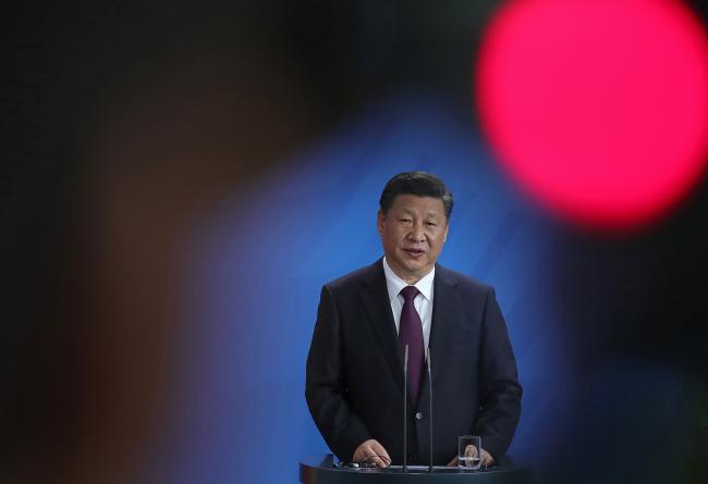 © Bloomberg. Xi Jinping, China's President, speaks during a news conference with Germany's Chancellor Angela Merkel (not pictured) at the Chancellery in Berlin, Germany, on Wednesday, July 5, 2017.