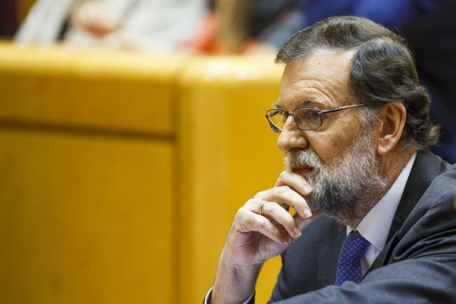 © Bloomberg. Mariano Rajoy, Spain's prime minister, looks on during a session in the senate in Madrid, Spain, on Friday, Oct. 27, 2017.