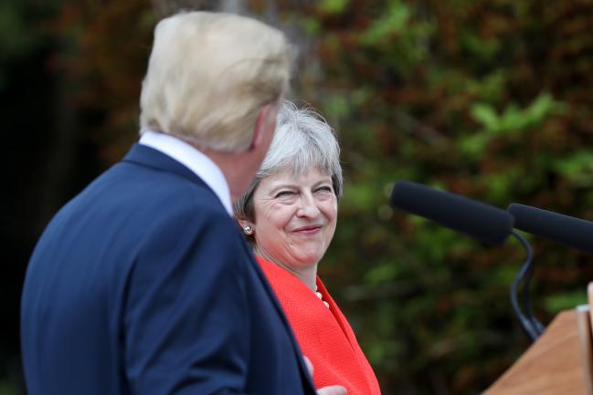 © Bloomberg. May and Trump. Photographer: Chris Ratcliffe/Bloomberg