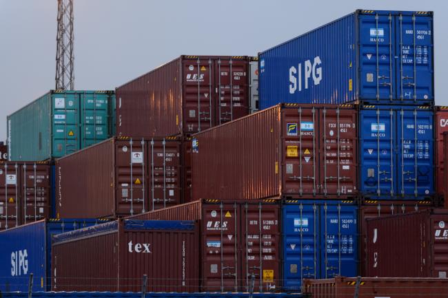 © Bloomberg. Containers sit stacked at a shipping terminal in Yokohama, Japan, on Tuesday, March 21, 2017. Japan’s exports rose the most in two years in February, after a lull in January that was due to the Lunar New Year celebrations in Asian trading partners. Photographer: Akio Kon/Bloomberg