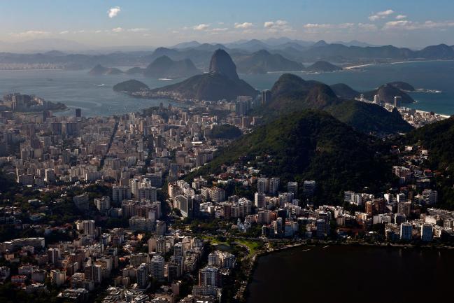 © Bloomberg. Aerial view from Guanabara bay in Rio de Janeiro, Brazil Thursday, July 4, 2013. (Bloomberg Photo/ Dado Galdieri)