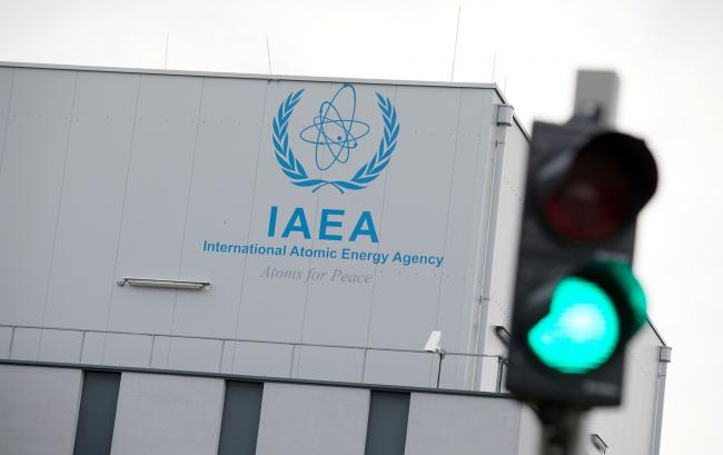 © Bloomberg. A picture taken on June 8, 2018 shows the logo of the International Atomic Energy Agency (IAEA) on the building of the IAEA laboratories in Seibersdorf, near Vienna. Photographer: Alex Halada/AFP/Getty Images