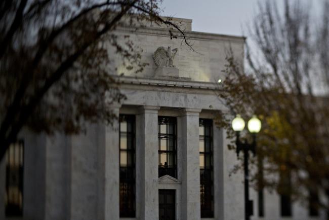© Bloomberg. (EDITORS NOTE: Image was created using a variable planed lens.) The Marriner S. Eccles Federal Reserve building stands in Washington, D.C., U.S., on Friday, Nov. 18, 2016. Federal Reserve Chair Janet Yellen told lawmakers on Thursday that she intends to stay in the job until her term expires in January 2018 while extolling the virtues of the Fed's independence from political interference. Photographer: Andrew Harrer/Bloomberg