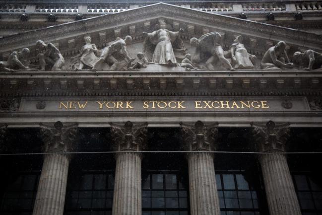 © Bloomberg. Rain falls on the New York Stock Exchange (NYSE) in New York, U.S., on Friday, March 2, 2018.