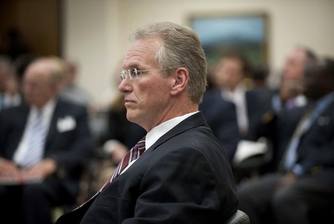 © Bloomberg. Bill Johnson waits to testify at a hearing of the North Carolina Utilities Commission in Raleigh, North Carolina, on July 19, 2012.  Photographer: Davis Turner/Bloomberg