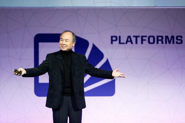 © Bloomberg. Billionaire Masayoshi Son, chairman and chief executive officer of SoftBank Group Corp., gestures while delivering a keynote speech on the opening day of the Mobile World Congress (MWC) in Barcelona, Spain, on Monday, Feb. 27, 2017. A theme this year at the industry's annual get-together, which runs through March 2, is the Internet of Things.