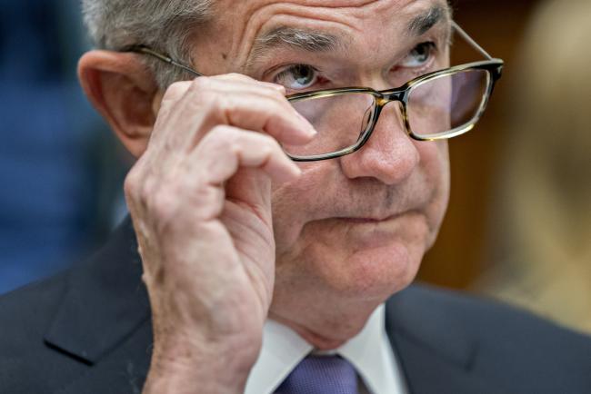 © Bloomberg. Jerome Powell, chairman of the U.S. Federal Reserve, removes his glasses during a House Financial Services Committee hearing in Washington, D.C., U.S., on Wednesday, July 18, 2018. Powell has a judgment to make on how hard monetary policy is biting down on the U.S. economy. The signal came from two words: 