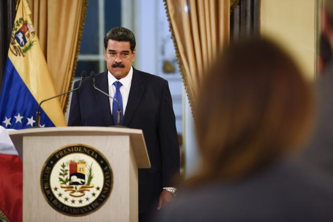 © Bloomberg. Nicolas Maduro, Venezuela's president, arrives to speak during a televised press conference in Caracas, Venezuela, on Friday, Feb. 8, 2019. Maduro denounced the presence of trailers of humanitarian aid brought to the Colombian border, calling them part of a plan cooked up in Washington to destabilize his government. 