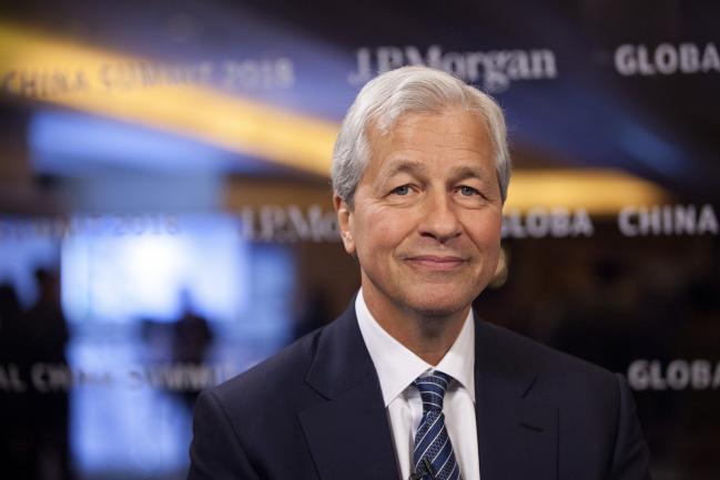 © Bloomberg. Jamie Dimon, chief executive officer of JPMorgan Chase & Co., poses for a photograph ahead of a Bloomberg Television interview on the sidelines of the JP Morgan Global China Summit in Beijing, China, on Tuesday, May 8, 2018. Photographer: Giulia Marchi/Bloomberg