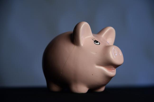 © Bloomberg. A piggy bank is arranged for a photograph in Melbourne, Australia. 