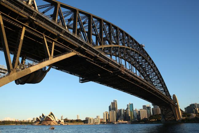 © Bloomberg. The Sydney Harbor Bridge stands in Sydney, Australia, on Tuesday, July 21, 2015.  Photographer Brendon Thorne/Bloomberg 