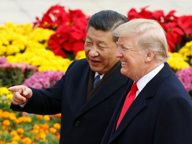 © Bloomberg. BEIJING, CHINA - NOVEMBER 9: Chinese President Xi Jinping and U.S. President Donald Trump attend a welcoming ceremony November 9, 2017 in Beijing, China. Trump is on a 10-day trip to Asia. (Photo by Thomas Peter-Pool/Getty Images) 