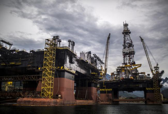 © Bloomberg. A Petroleo Brasileiro SA (Petrobras) Floating Production Storage and Offloading (FPSO) vessel sits at a maintenance shipyard in Angra dos Reis, Brazil. Photographer: Dado Galdieri/Bloomberg