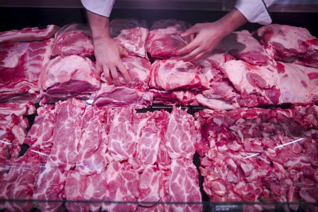 © Bloomberg. An employee arranges a display of fresh cuts of beef at the butchers counter inside a Super Konzum supermarket, operated by Agrokor dd, in Zagreb, Croatia, on Tuesday, June 13, 2017. Croatian retailer Agrokor secured a new loan of 530 million euros ($596 million) from Knighthead Capital Management and Zagrebacka Banka d.d., a local unit of UniCredit SpA, in a bid to restructure its debt and continue operating. 