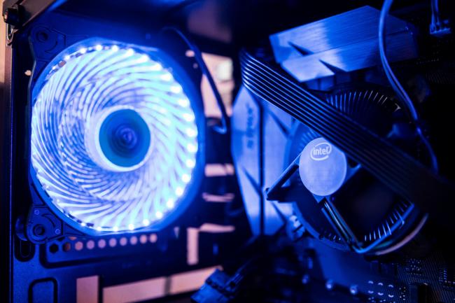 © Bloomberg. An Intel Corp. heat sink and fan (HSF) for a central processing unit (CPU), sit inside a 'mining rig' computer, used to mine the Electroneum cryptocurrency, in Budapest, Hungary, on Wednesday, Jan. 31, 2018. Cryptocurrencies are not living up to their comparisons with gold as a store of value, tumbling Monday as an equities sell-off in Asia extended the biggest rout in global stocks in two years.