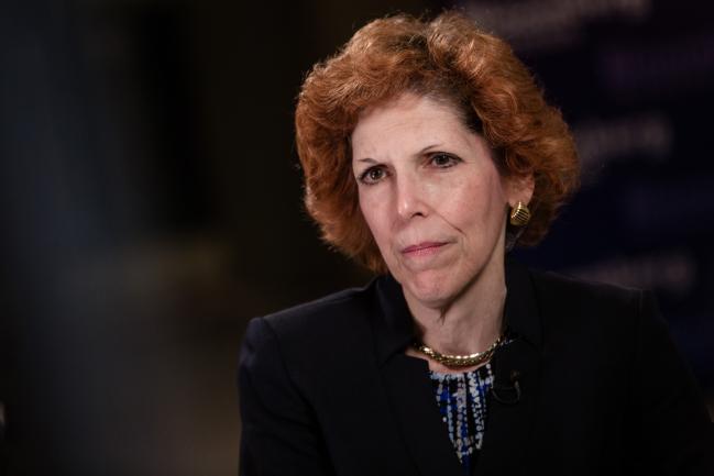 © Bloomberg. Loretta Mester, president of the Federal Reserve Bank of Cleveland, pauses during a Bloomberg Television interview at the French central bank and Global Interdependance Center (GIC) conference in Paris, France, on Monday, May 14, 2018. European Central Bank policy maker Francois Villeroy de Galhau said the first interest-rate increase could come “some quarters, but not years” after policy makers end their bond-buying program. Photographer: Marlene Awaad/Bloomberg