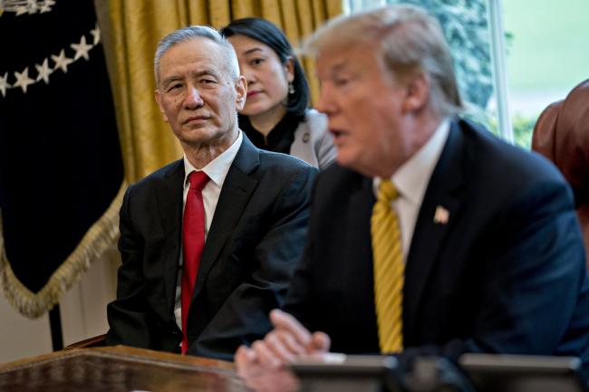 © Bloomberg. Liu He, China's vice premier, listens as U.S. President Donald Trump, right, speaks during a meeting in the Oval Office of the White House in Washington, D.C., U.S., on Thursday, April 4, 2019. Trump said a deal to end the trade war between the U.S. and China isn't yet ready but a 