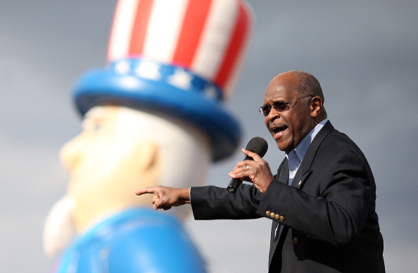 © Bloomberg. RENO, NV - JULY 23: Former Republican presidential candidate Herman Cain speaks during an American For Prosperity rally on July 23, 2012 in Reno, Nevada. Hundreds of people attended an Americans For Prosperity rally to see former Republican presidential candidate speak. (Photo by Justin Sullivan/Getty Images)