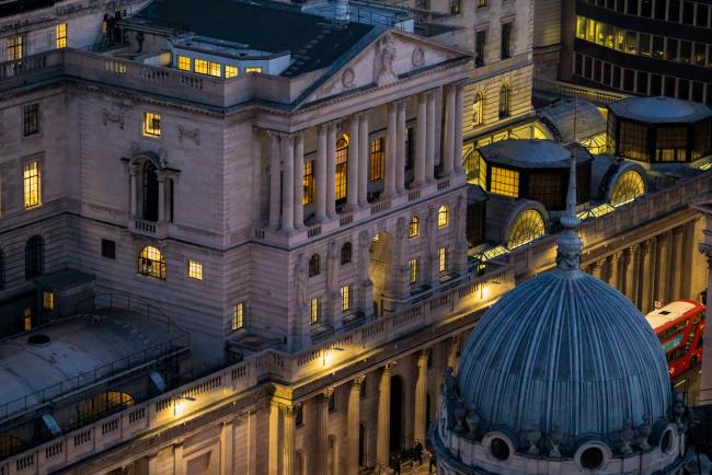 © Bloomberg. The Bank of England (BOE) stands illuminated at dawn in the City of London, U.K., on Monday, Feb. 25, 2019. The U.K. and U.S. sought to allay fears of disruption in the multitrillion-dollar derivatives market, vowing to put in place emergency policies to ensure trading continues uninterrupted in the event of a no-deal Brexit. Photographer: Jason Alden/Bloomberg