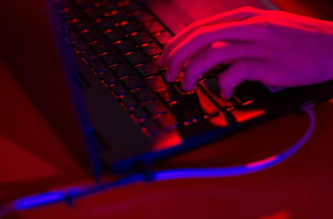 © Bloomberg. Red light illuminates the keys of a laptop computer at the Dreamhack digital festival in Moscow, Russia, on Saturday, Dec. 5, 2015. Dreamhack is the world's largest digital festival and meeting place for gamers, fans and e-sport enthusiasts. 