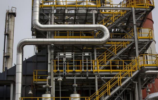 © Bloomberg. Plant 5100, an electricity production facility, stands at the Ecopetrol SA refinery in Barrancabermeja, Santander, Colombia. Photographer: Nicolo Filippo Rosso/Bloomberg