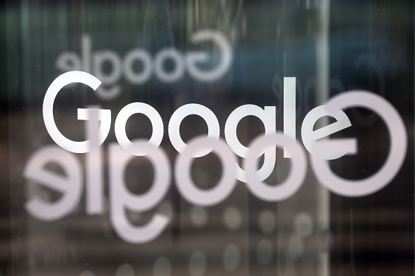 © Bloomberg. The Google Inc. company logo sits on revolving doors at the company's new U.K. headquarters at Six St Pancras Square in London, U.K., on Tuesday, June 21, 2016. The owner of the world's largest search engine built its new U.K. headquarters on 2.4 acres (1 hectare) of land that's part of a larger development by King's Cross Central LP near the Eurostar rail link to mainland Europe.