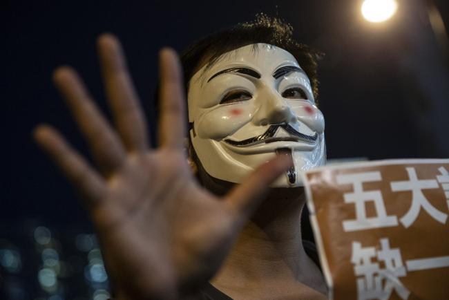Hong Kong Protesters Could Face a Year in Jail for Wearing a Mask: SCMP