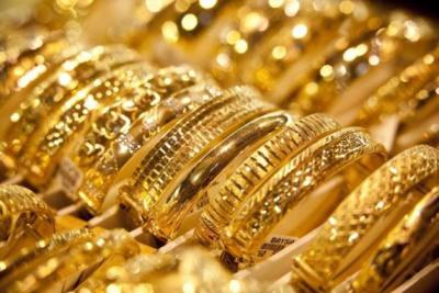 Vàng thế giới rớt mốc 1,300 USD/oz, chạm đáy 1 tuần