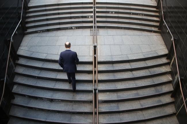 © Bloomberg. A man walks up a flight of stairs at Martin Place in Sydney, Australia, on Thursday, Aug. 17, 2017. Australian employers added more jobs than forecast in July, underscoring the central bank’s confidence in an improving labor market. Photographer: Brendon Thorne/Bloomberg