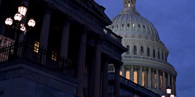 © Bloomberg. The U.S. Capitol stands in Washington, D.C., U.S., on Sunday, Jan. 21, 2018. The House and Senate are back in session Sunday with a federal government shutdown in its second day amid a spending-bill impasse in Congress. The House is supposed to be on recess this week, but members stayed in Washington as negotiations continue.