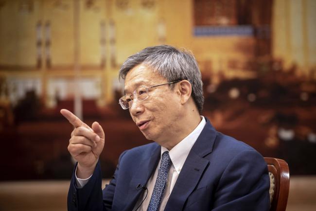 © Bloomberg. Yi Gang, governor of the People's Bank of China (PBOC), sits ahead of an interview in Beijing, China, on Friday, June 7, 2019. China has 