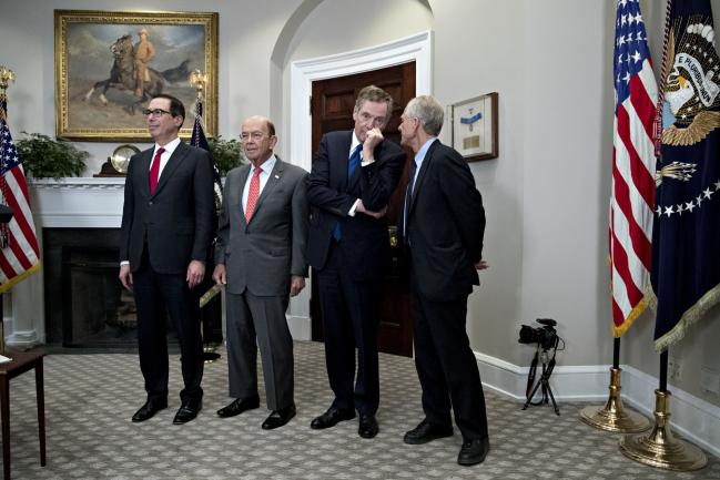 © Bloomberg. From left, Steven Mnuchin, Wilbur Ross, Peter Navarro, and Robert Lighthizer. Photographer: Andrew Harrer/Bloomberg 