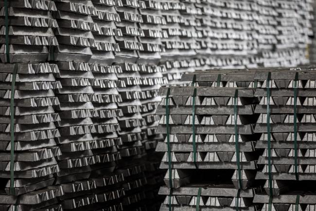 © Bloomberg. Bound aluminum ingots sit stacked in a warehouse ahead of shipping at the Alumetal Group Hungary Kft. aluminium processing plant in Komarom, Hungary on Monday, March 19, 2018. The European Union believes it's on track to be exempted from imminent U.S. tariffs on foreign steel and aluminium, dialling down the risk of a trans-Atlantic trade war. Photographer: Akos Stiller/Bloomberg
