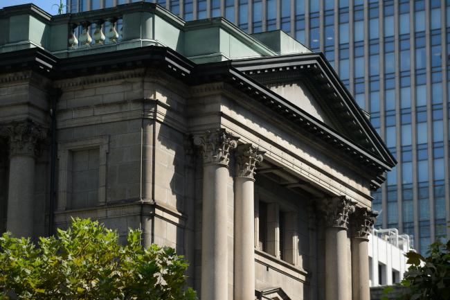 © Bloomberg. The Bank of Japan (BOJ) headquarters stands in Tokyo, Japan, on Wednesday, Sept. 13, 2017. The BOJ's next monetary policy meeting is scheduled for Sept. 21. The central bank pushed back in July the projected timing for reaching its 2 percent inflation target for the sixth time as economic growth failed to drive price gains. 